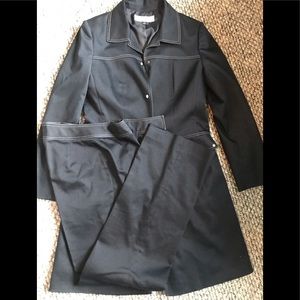 Black suit coat with matching dress pants.